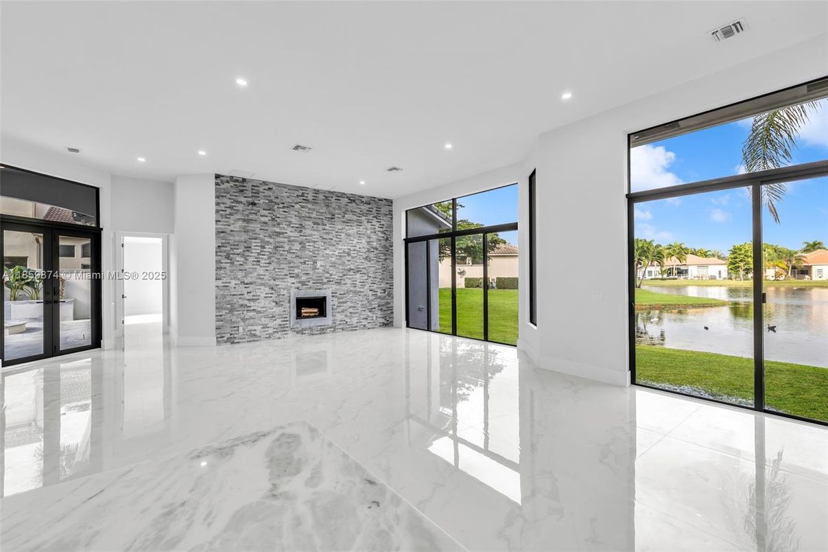 Empty room, Fireplace, Interior, Marble, Recessed Lighting, Stone Walls, Water