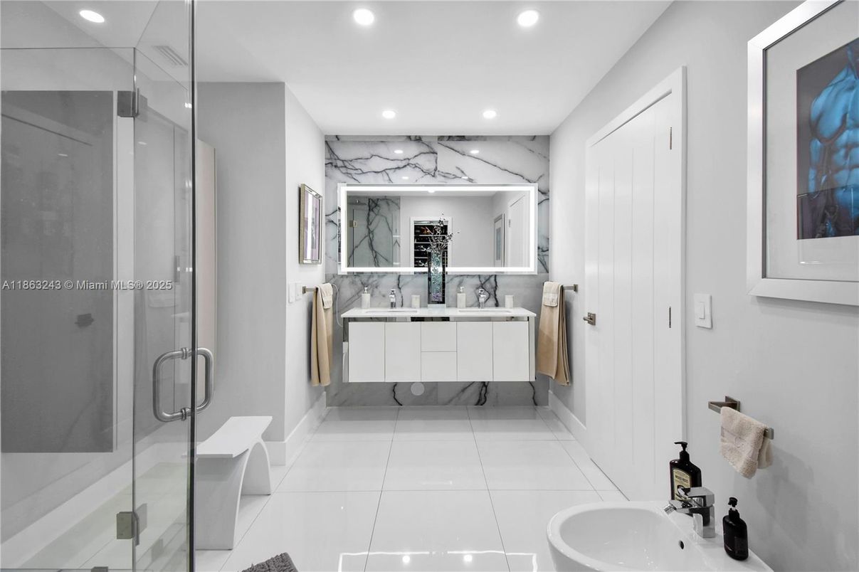Bathroom, Dual Sink Vanities, Glass Shower, Interior, Marble Walls, Recessed Lighting