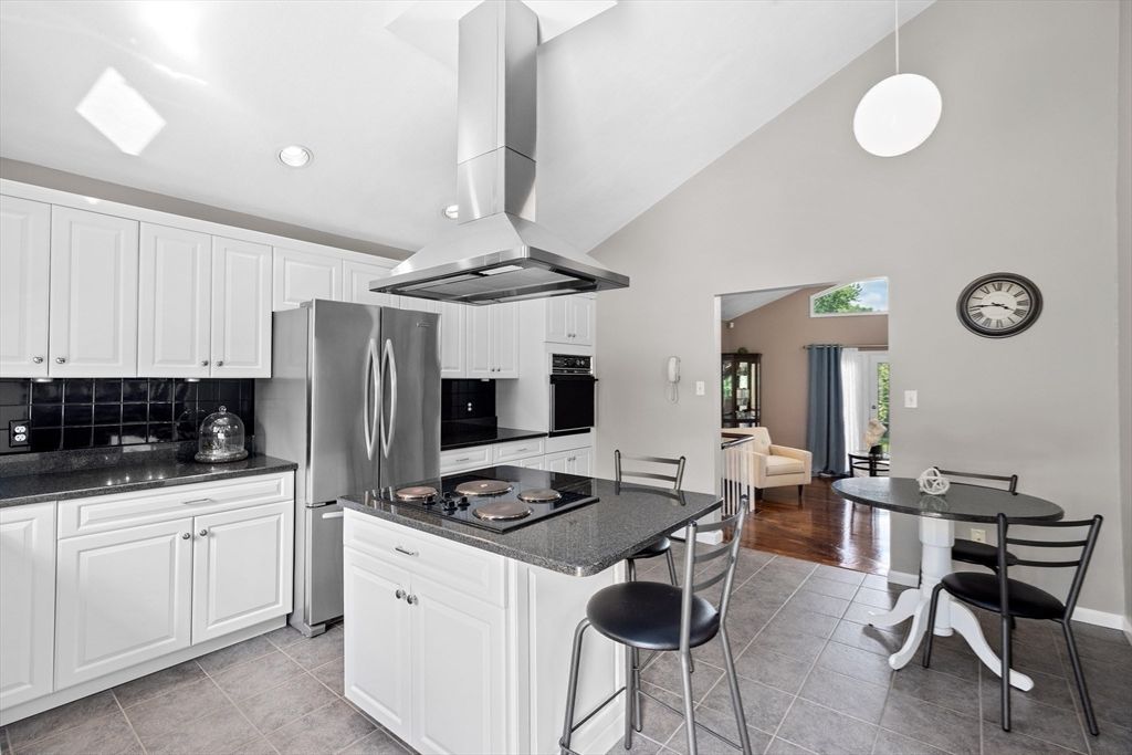 Dining room, Interior, Kitchen, Living room, Pendant Lights, Recessed Lighting, Stainless Steel Appliances, Wood Texture Flooring
