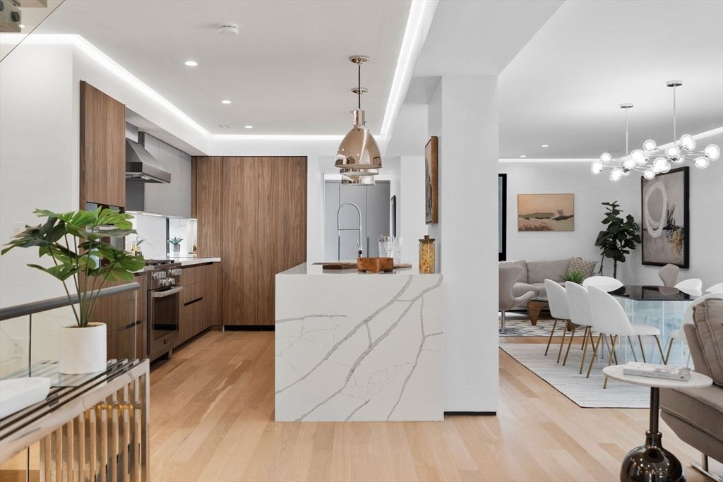 Dining room, Interior, Kitchen, Pendant Lights, Recessed Lighting, Stainless Steel Appliances, Wood Texture Flooring