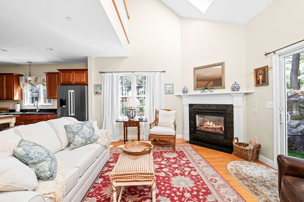 Fireplace, Interior, Kitchen, Living room, Pendant Lights, Recessed Lighting, Stainless Steel Appliances, Wood Texture Flooring