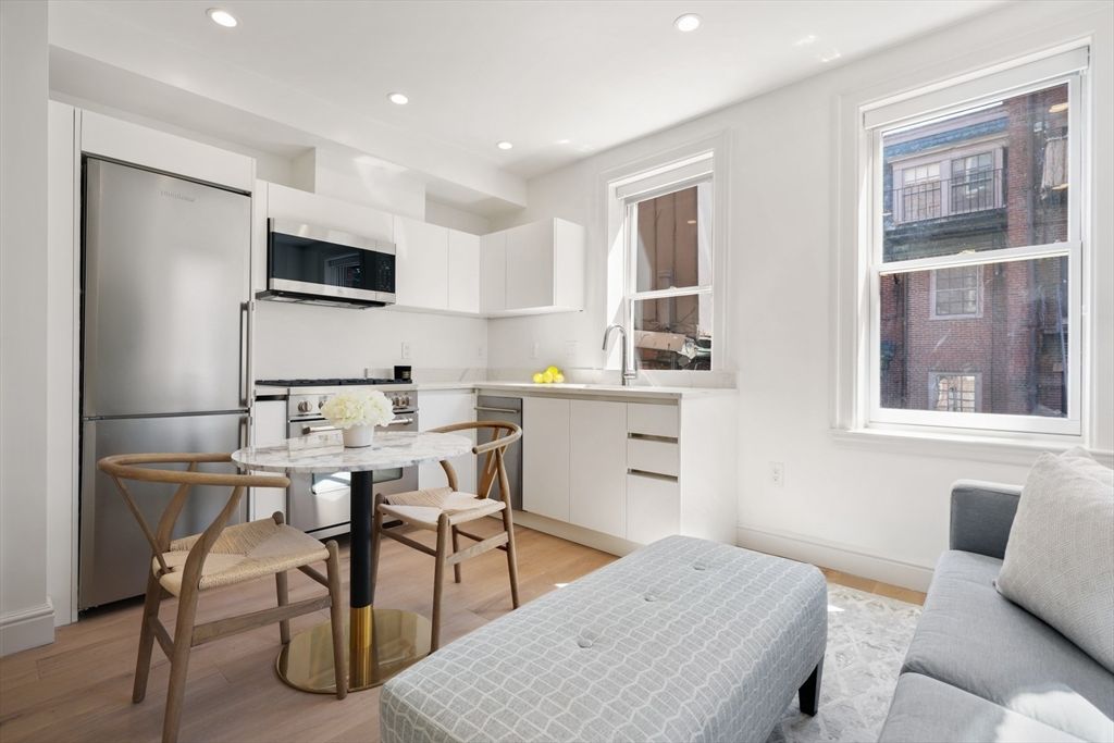 Dining room, Interior, Kitchen, Recessed Lighting, Stainless Steel Appliances, Wood Texture Flooring