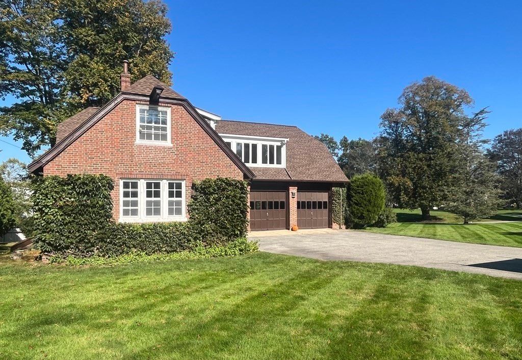 Attached, Backyard, Exterior, Facade, Brick Facade, Tudor Revival