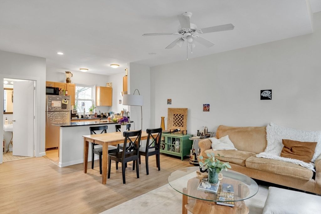 Dining room, Interior, Kitchen, Living room, Recessed Lighting, Stainless Steel Appliances, Wood Texture Flooring