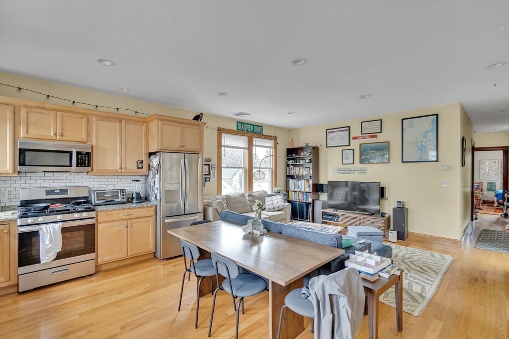 Dining room, Interior, Kitchen, Living room, Recessed Lighting, Stainless Steel Appliances, Wood Texture Flooring