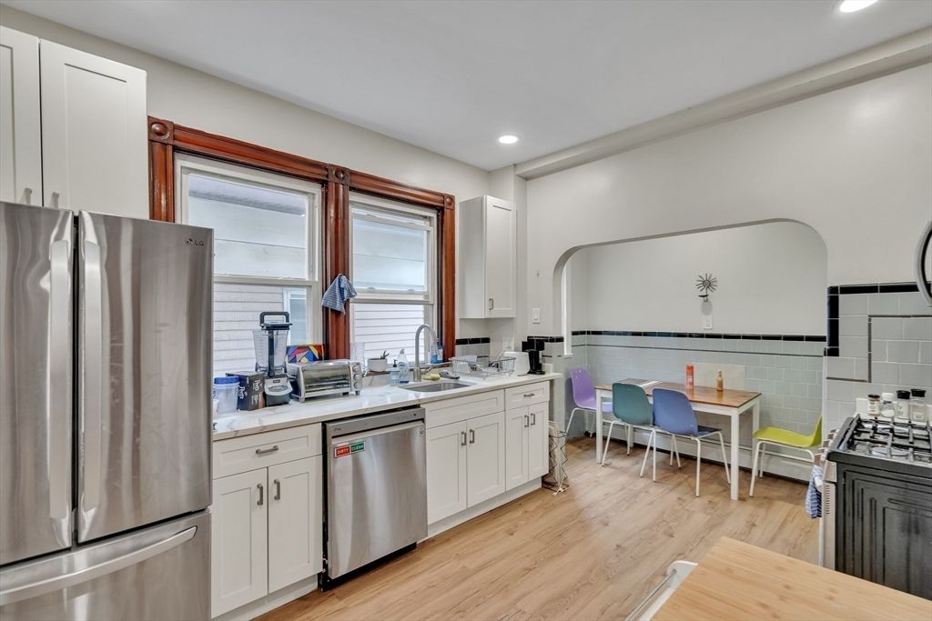 Dining room, Interior, Kitchen, Recessed Lighting, Stainless Steel Appliances, Wood Texture Flooring