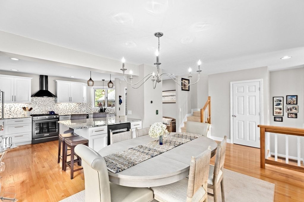 Chandelier, Dining room, Interior, Kitchen, Pendant Lights, Recessed Lighting, Stainless Steel Appliances, Wood Texture Flooring