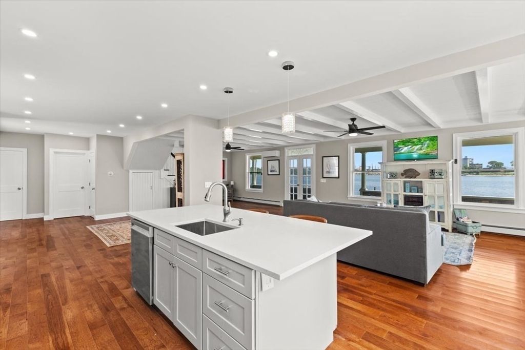 Fireplace, Interior, Kitchen, Living room, Pendant Lights, Recessed Lighting, Water, Wood Texture Flooring