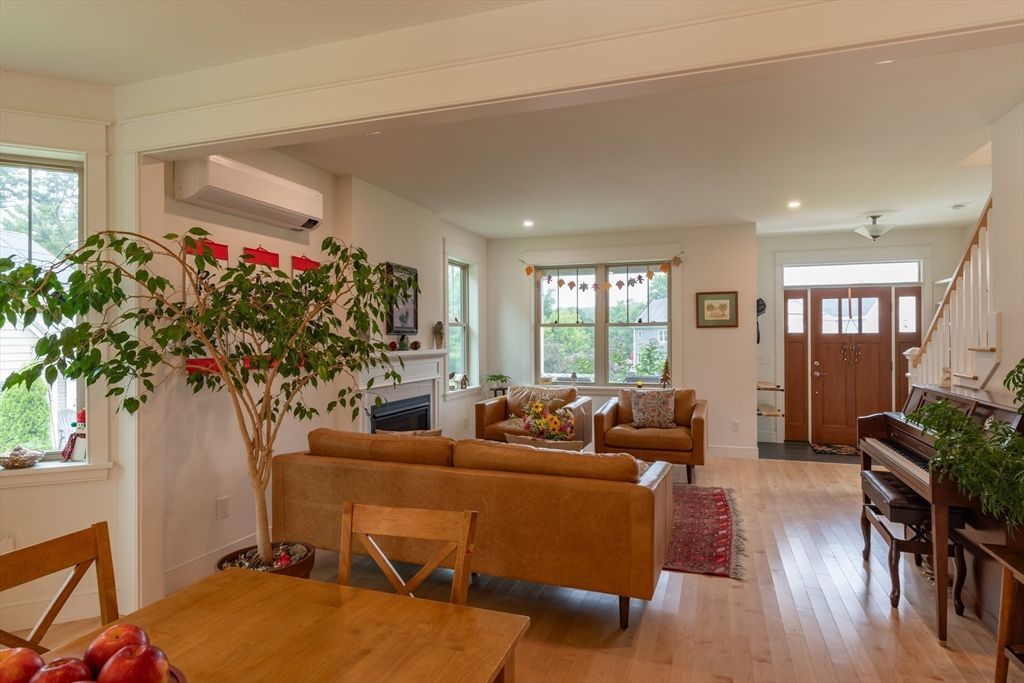 Fireplace, Interior, Living room, Piano, Recessed Lighting, Wood Texture Flooring