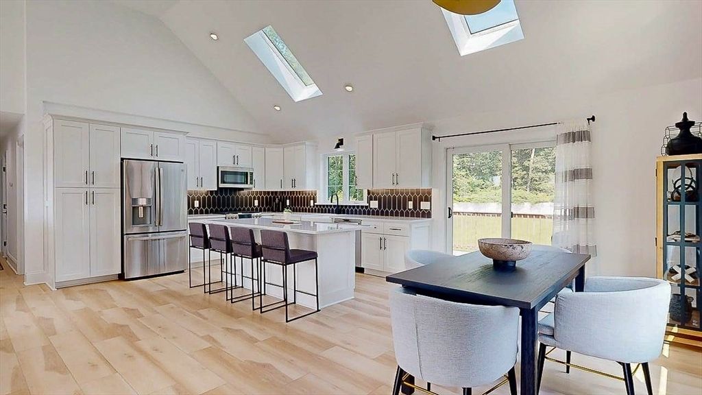 Dining room, Interior, Kitchen, Recessed Lighting, Stainless Steel Appliances, Wood Texture Flooring