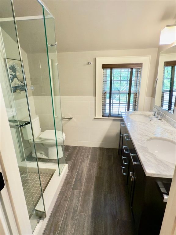 Bathroom, Dual Sink Vanities, Glass Shower, Interior, Wood Texture Flooring