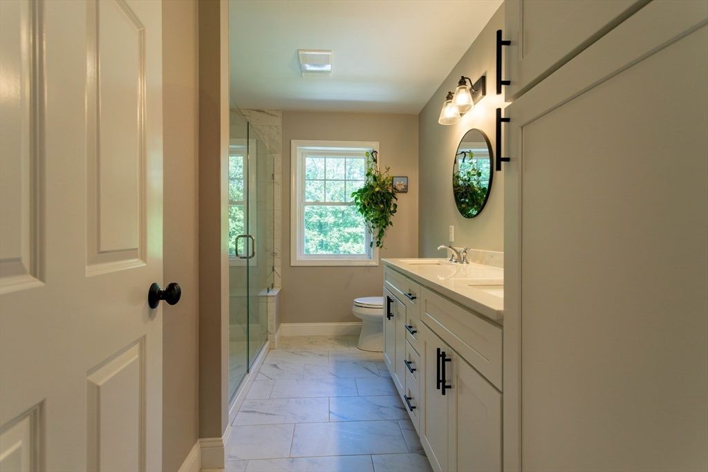 Bathroom, Dual Sink Vanities, Glass Shower, Interior, Marble, Marble Walls