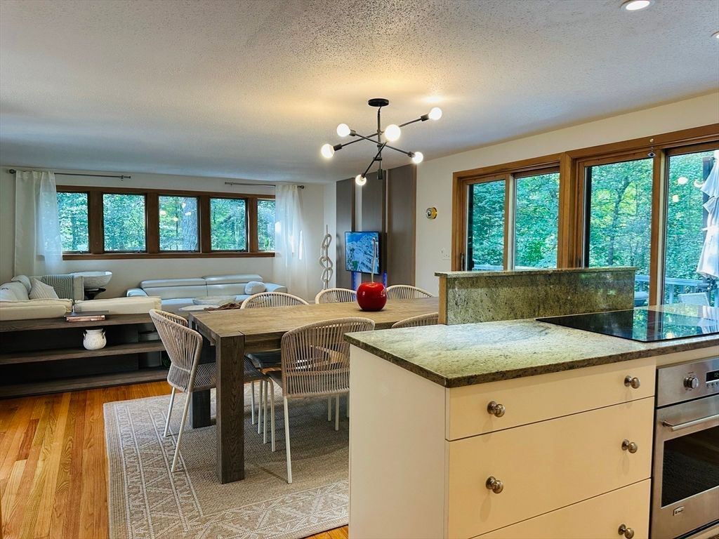 Dining room, Interior, Kitchen, Living room, Pendant Lights, Recessed Lighting, Wood Texture Flooring