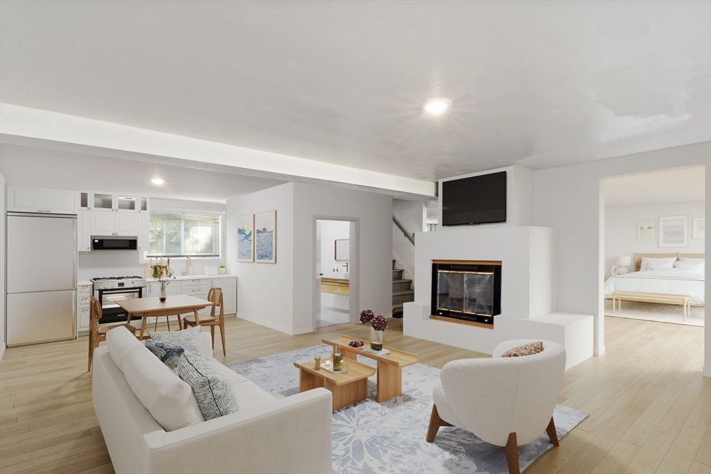 Dining room, Fireplace, Interior, Kitchen, Living room, Recessed Lighting, Stainless Steel Appliances, Wood Texture Flooring