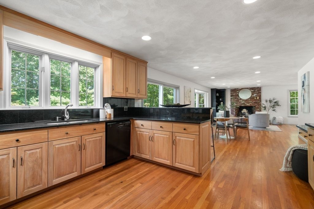 Dining room, Fireplace, Interior, Kitchen, Living room, Recessed Lighting, Stone Walls, Wood Texture Flooring