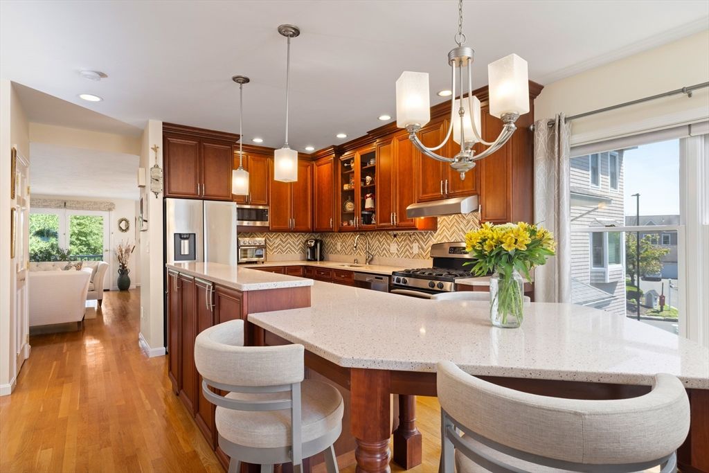 Chandelier, Interior, Kitchen, Living room, Pendant Lights, Recessed Lighting, Stainless Steel Appliances, Wood Texture Flooring