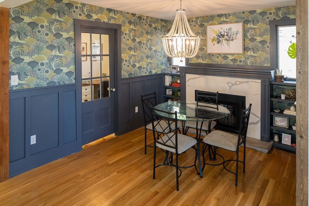 Dining room, Fireplace, Interior, Pendant Lights, Wood Texture Flooring