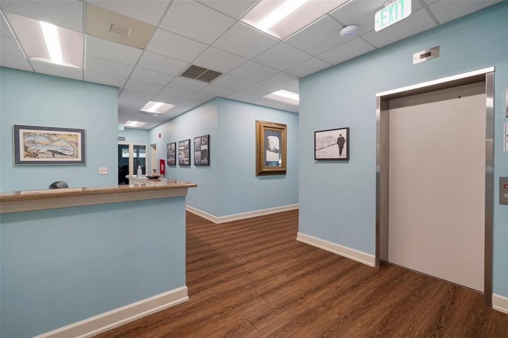 Elevator, Interior, Recessed Lighting, Wood Texture Flooring