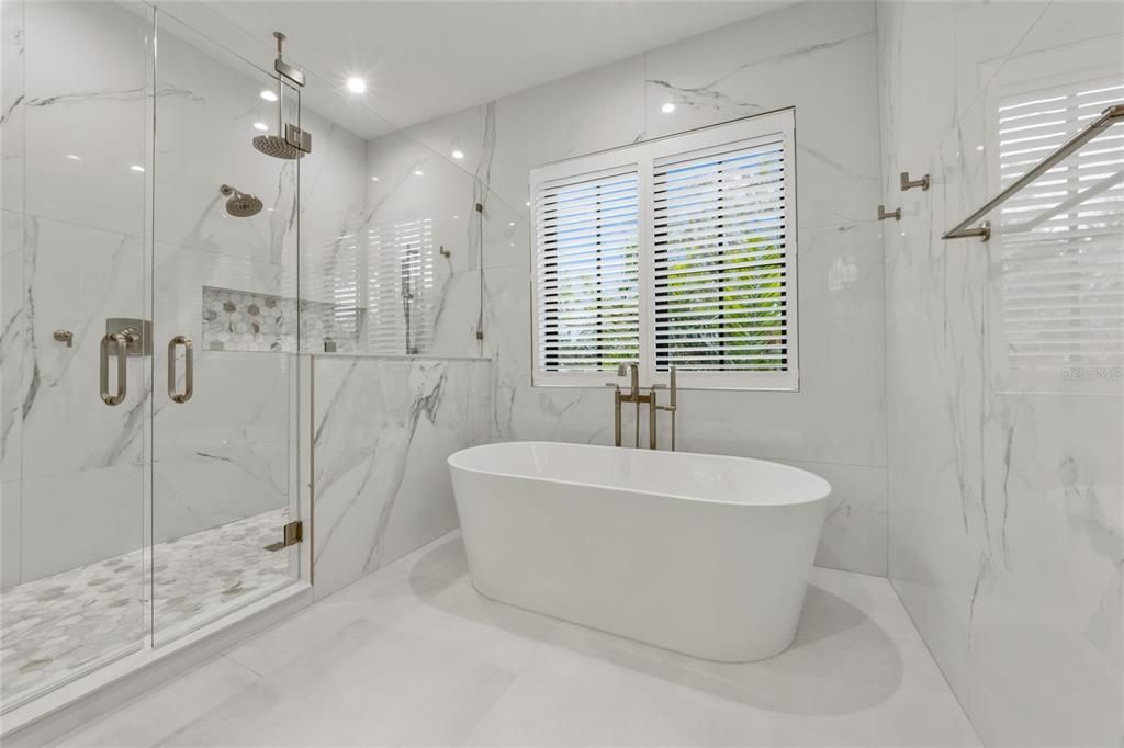 Bathroom, Free Standing Baths, Glass Shower, Interior, Marble Walls, Recessed Lighting