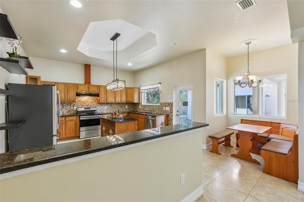 Chandelier, Dining room, Interior, Kitchen, Pendant Lights, Recessed Lighting, Stainless Steel Appliances