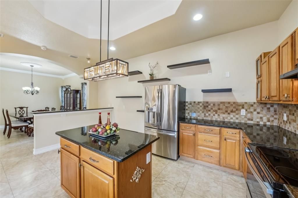 Chandelier, Dining room, Interior, Kitchen, Pendant Lights, Recessed Lighting, Stainless Steel Appliances