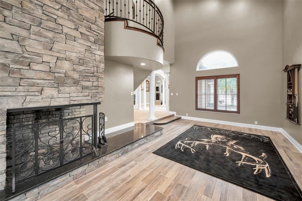 Fireplace, Interior, Recessed Lighting, Stone Walls, Wood Texture Flooring