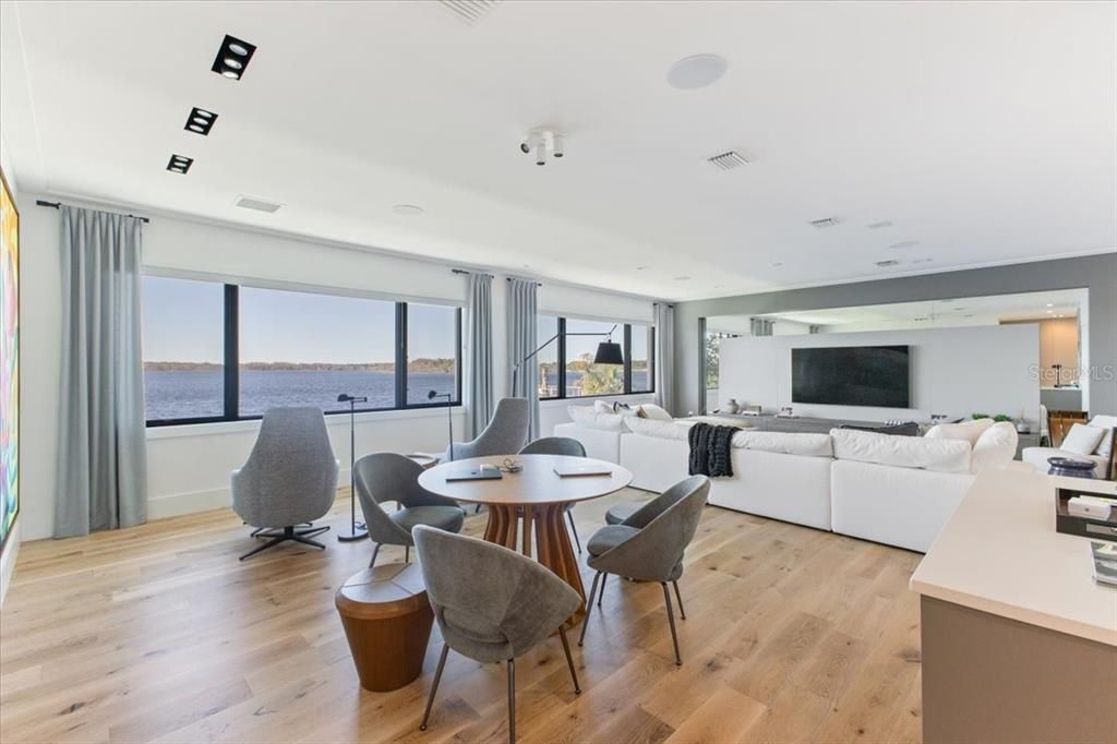 Dining room, Interior, Living room, Recessed Lighting, Water, Wood Texture Flooring