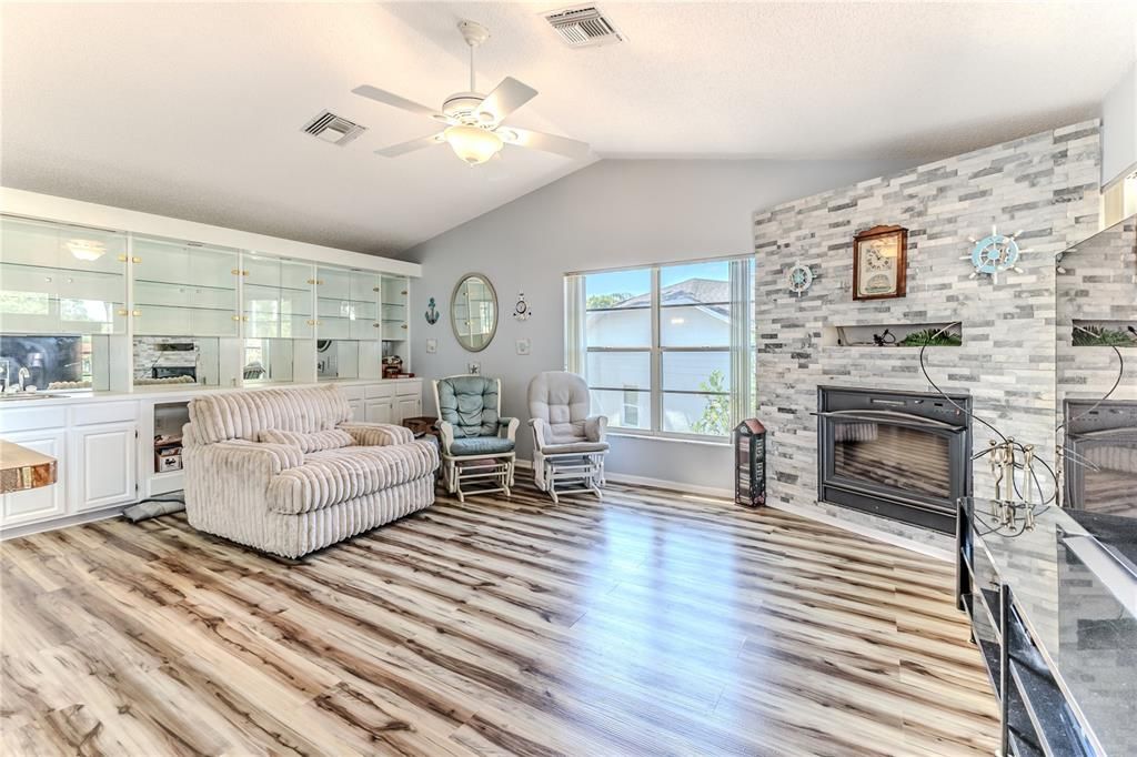 Fireplace, Interior, Living room, Stone Walls, Water, Wood Texture Flooring
