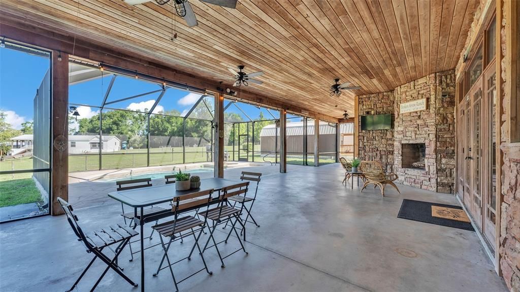 Fireplace, Glass Ceilings, Interior, Stone Walls, Sun Room, Wooden Ceilings