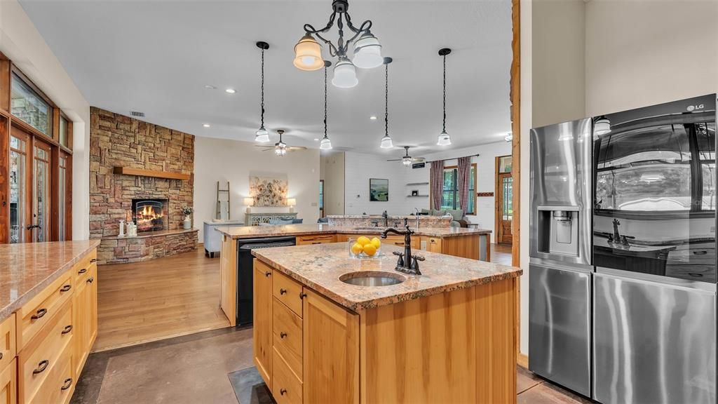 Fireplace, Interior, Kitchen, Pendant Lights, Recessed Lighting, Stone Walls, Wood Texture Flooring