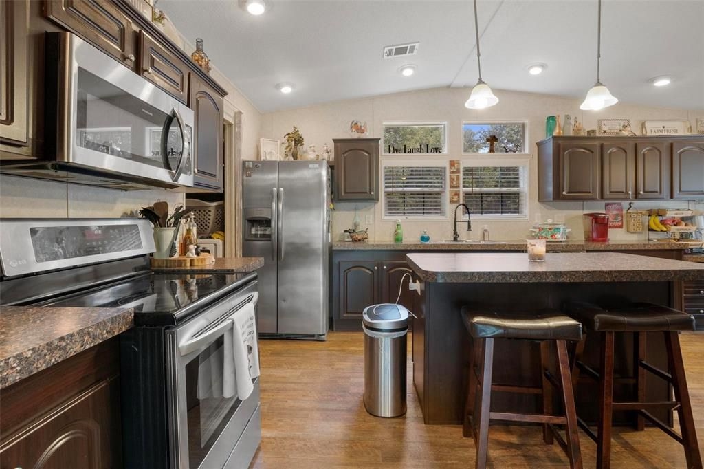 Interior, Kitchen, Pendant Lights, Recessed Lighting, Stainless Steel Appliances, Wood Texture Flooring