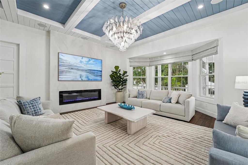 Chandelier, Fireplace, Interior, Living room, Recessed Lighting, Wood Texture Flooring