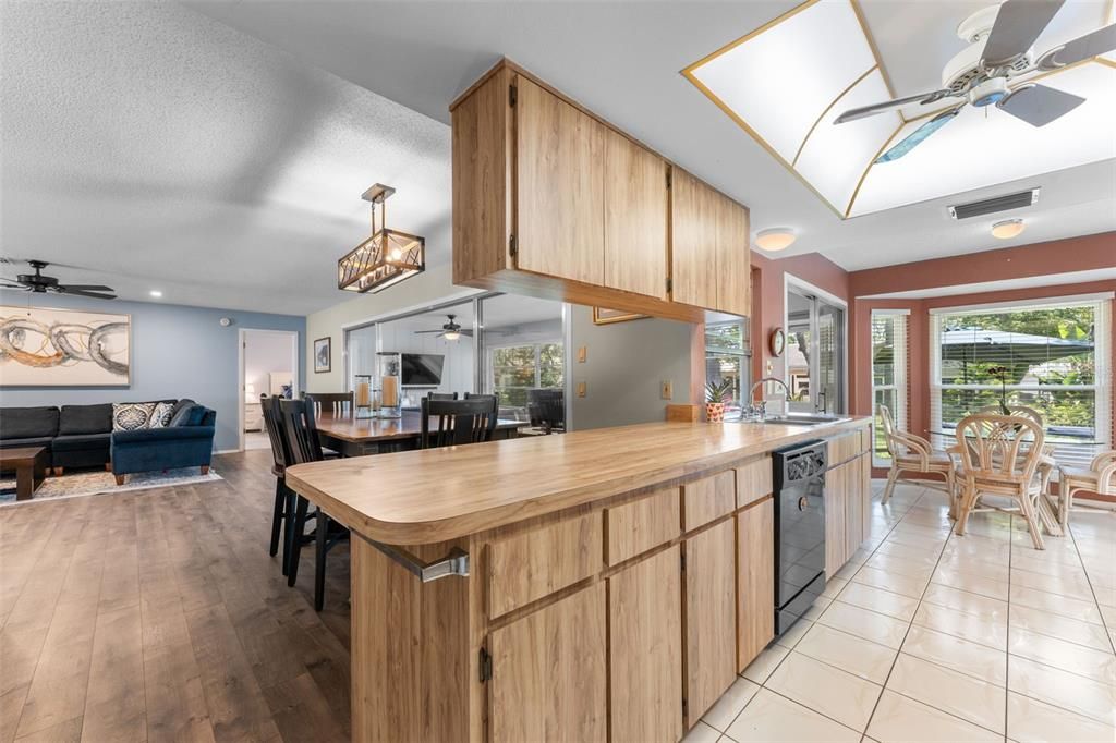 Dining room, Interior, Kitchen, Living room, Recessed Lighting, Wood Texture Flooring