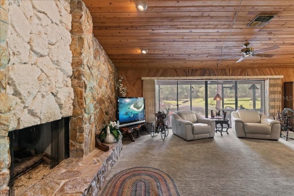 Fireplace, Interior, Living room, Recessed Lighting, Stone Walls, Wooden Ceilings, Wooden Walls