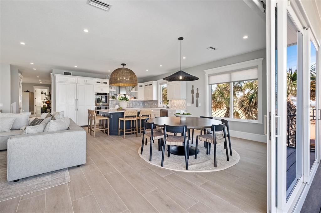 Dining room, Interior, Kitchen, Living room, Pendant Lights, Recessed Lighting, Stainless Steel Appliances, Wood Texture Flooring