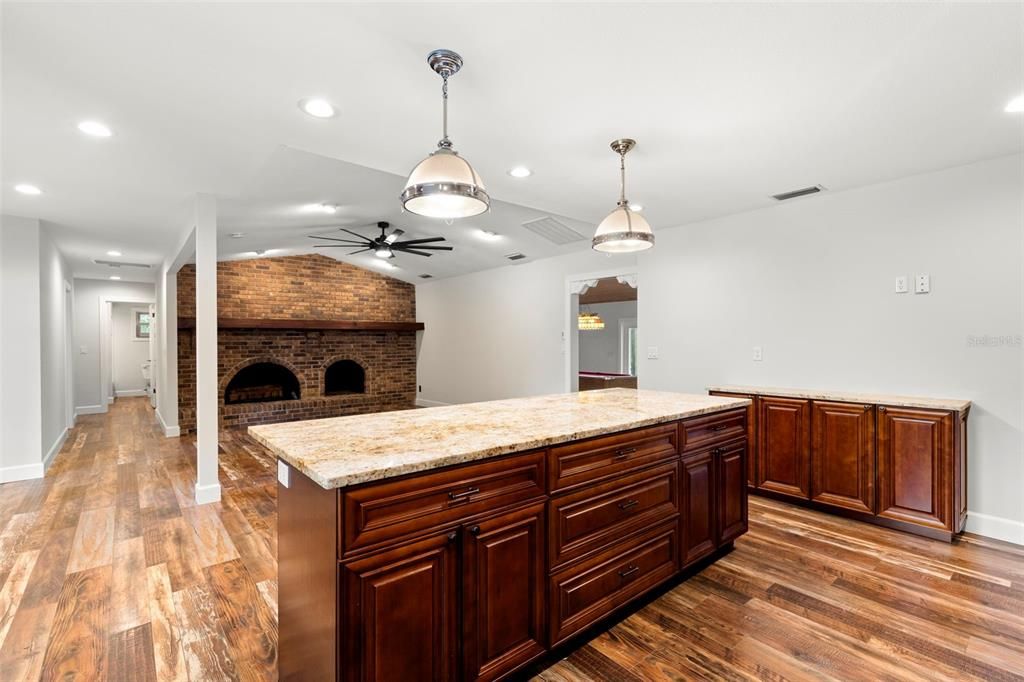 Fireplace, Interior, Pendant Lights, Recessed Lighting, Stone Walls, Wood Texture Flooring