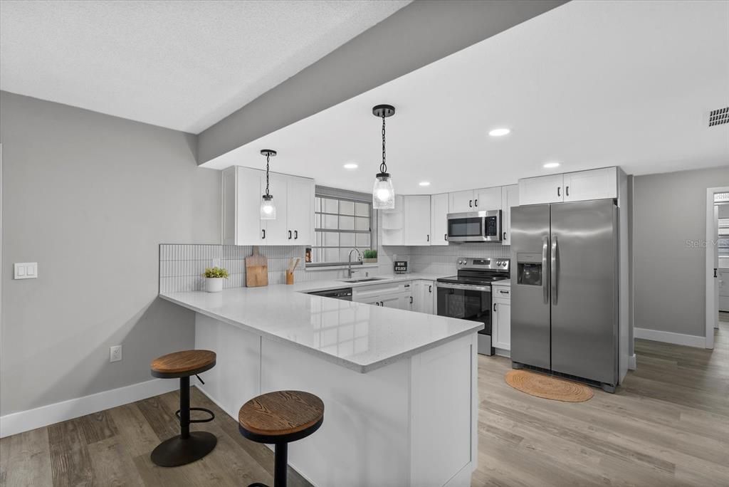 Interior, Kitchen, Pendant Lights, Recessed Lighting, Stainless Steel Appliances, Wood Texture Flooring