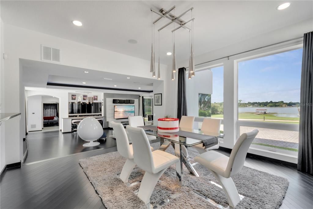 Dining room, Fitness Equipment, Interior, Pendant Lights, Recessed Lighting, Water, Wood Texture Flooring