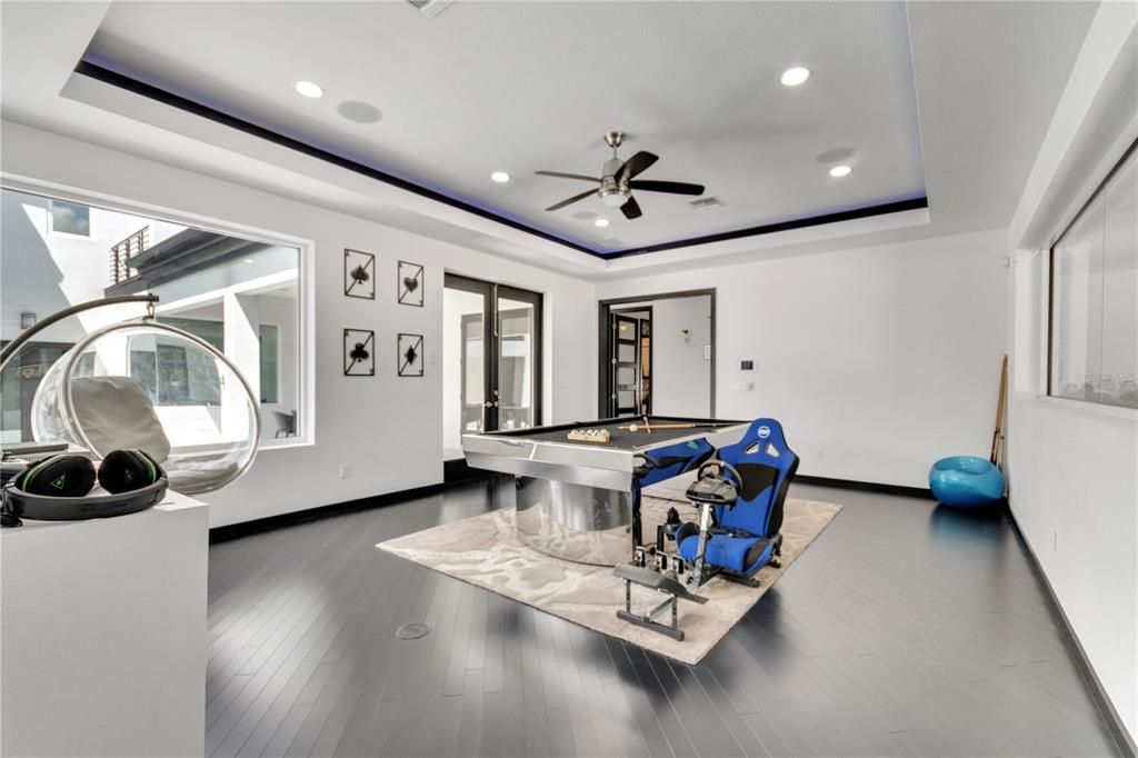 Billiard Table, Fitness Equipment, Game Room, Interior, Recessed Lighting, Wood Texture Flooring