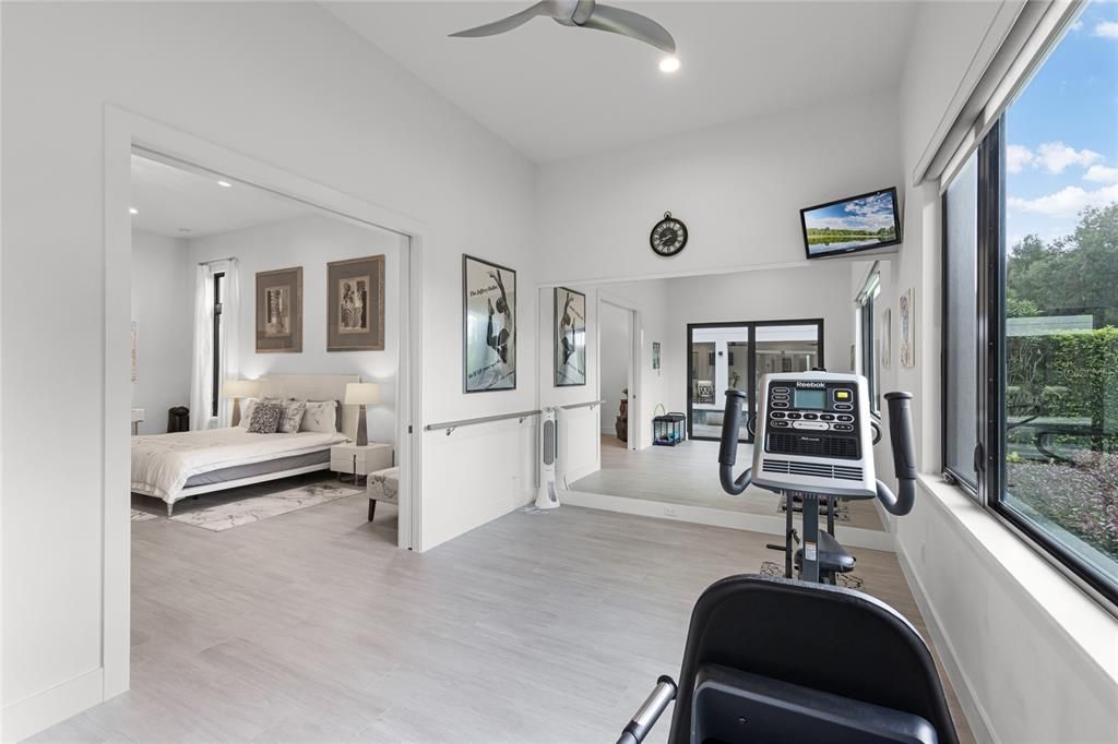 Bedroom, Fitness Equipment, Interior, Recessed Lighting, Wood Texture Flooring