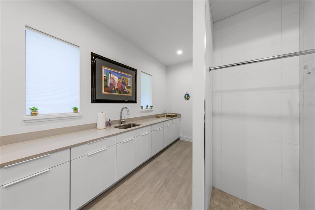 Bathroom, Dual Sink Vanities, Interior, Recessed Lighting, Wood Texture Flooring