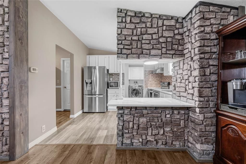 Interior, Kitchen, Stainless Steel Appliances, Stone Walls, Wood Texture Flooring