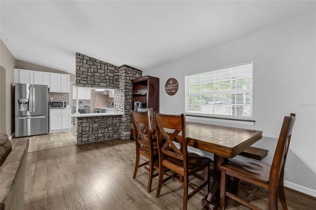 Dining room, Interior, Kitchen, Stainless Steel Appliances, Stone Walls, Wood Texture Flooring