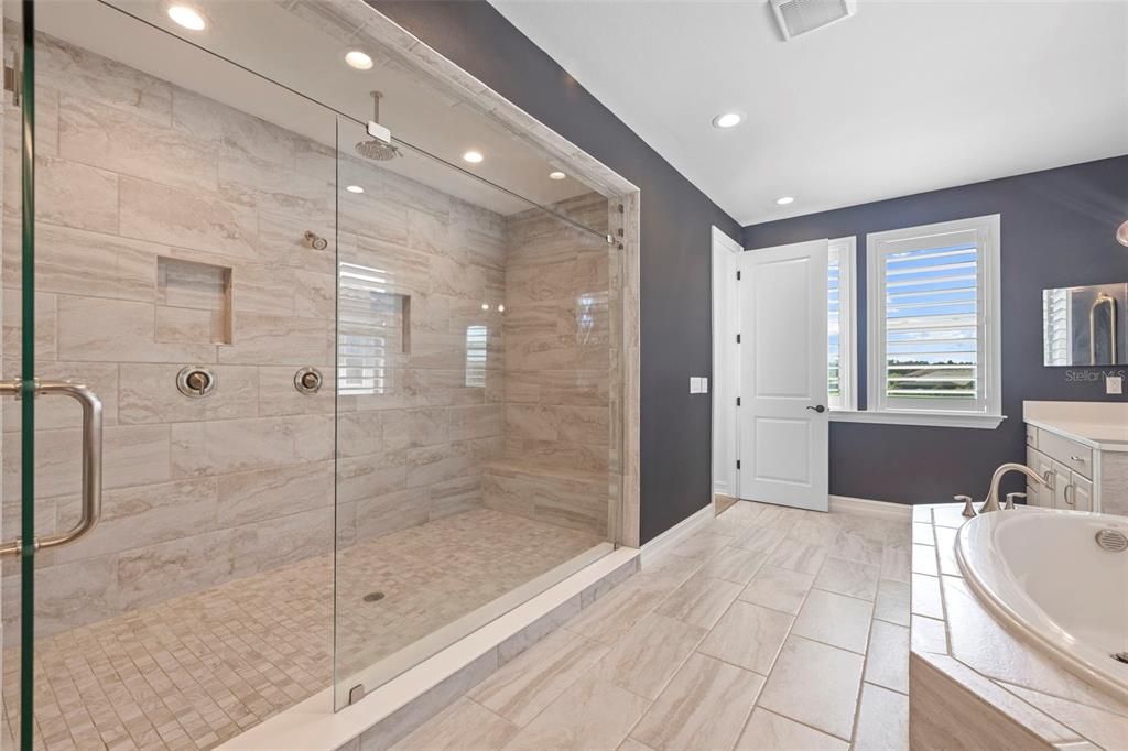 Bathroom, Dual Sink Vanities, Glass Shower, Interior, Marble Walls, Recessed Lighting