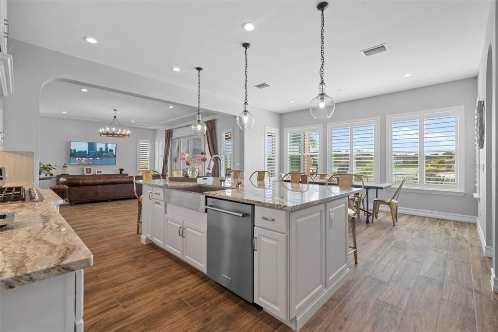 Chandelier, Dining room, Interior, Kitchen, Living room, Pendant Lights, Recessed Lighting, Wood Texture Flooring