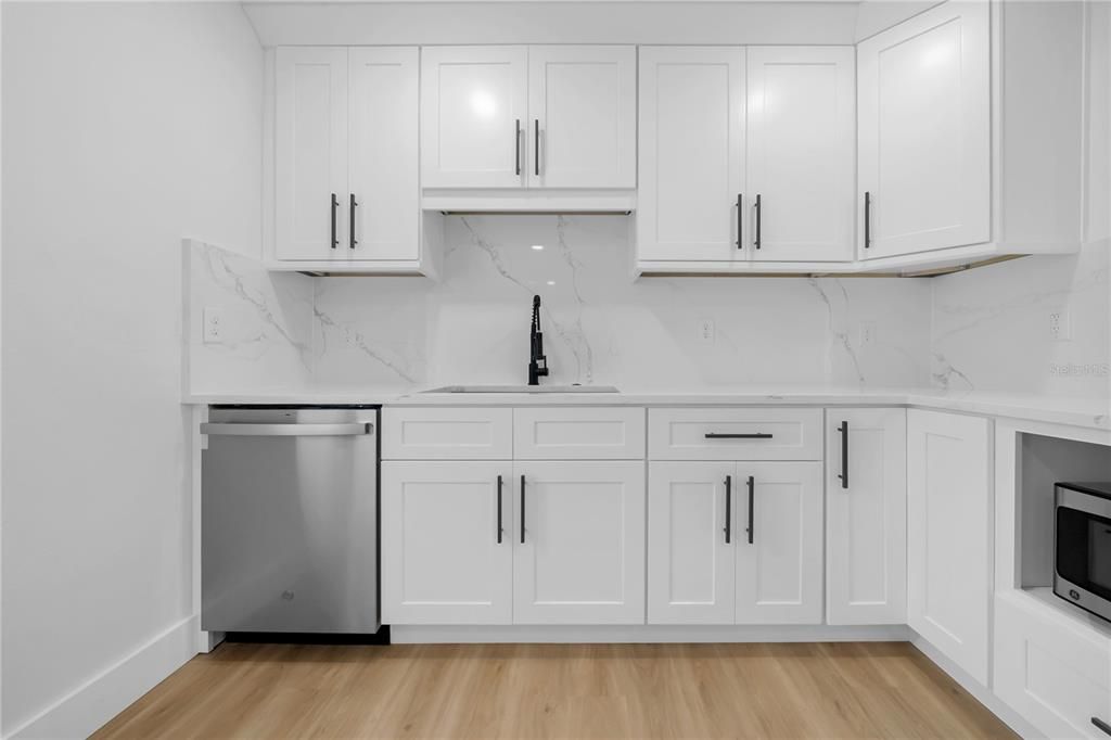 Interior, Kitchen, Marble Walls, Stainless Steel Appliances, Wood Texture Flooring