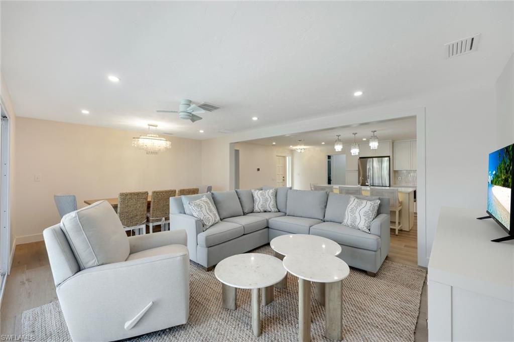 Chandelier, Dining room, Interior, Kitchen, Living room, Recessed Lighting, Stainless Steel Appliances, Wood Texture Flooring
