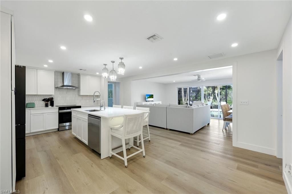Interior, Kitchen, Living room, Pendant Lights, Recessed Lighting, Stainless Steel Appliances, Wood Texture Flooring