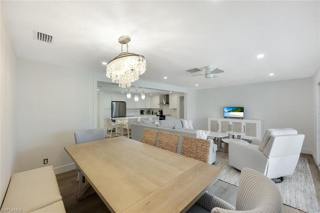 Chandelier, Dining room, Interior, Kitchen, Living room, Recessed Lighting, Wood Texture Flooring