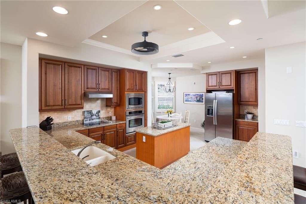 Chandelier, Dining room, Interior, Kitchen, Pendant Lights, Recessed Lighting, Stainless Steel Appliances